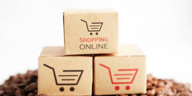 Shopping cart box on coffee beans, shopping online for export or import.